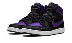 The Air Jordan 1 KO "Field Purple" is a colorway of the retro basketball shoe with a satin construction.  The original Jordan 1 KO was designed in a mostly all-canvas construction but on the “Field Purple,” Jordan Brand swaps the original textile with silky satin to give the shoe a decidedly premium look.  Tthe shoe features a Field Purple-colored satin toe with black satin on the overlays and mid-panel.  Both the Swoosh and ankle flaps are designed in Field Purple leather.  Underfoot, the shoe Prowler Jordans, Dark Purple Sneakers, Purple Shoes Outfit, Purple Jordans, Air Jordan 1 Court Purple, Jordan 1 Court Purple, Boty Nike, Jordan 1 Black, Retro Basketball Shoes