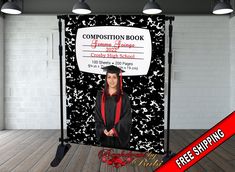 a graduation photo booth with a graduate's name and congratulations sign on the front