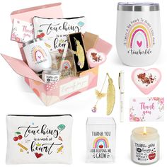 an assortment of personal care items in a pink gift box with rainbows and hearts