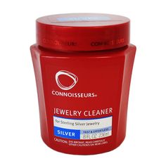 a jar of jewelry cleaner on a white background