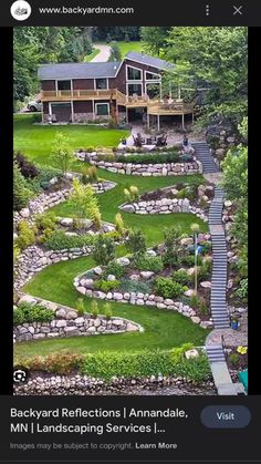 an aerial view of a house and its landscaping