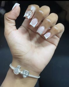 French Tip Nails With Design And Charms, Birthday Nails Stiletto Short, Cute Short Nails With Charms, Nails With A Cross Design, White French Tip Nails With Charms, Nails With Charms Simple, Short Acrylic Nails With Gems, Short Acrylic Nails With Charms, Simple Nails With Gems