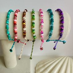 Wax Seed Bead Beach Bracelet! These have a sliding knot closure making them easily adjustable to any wrist size! Use the dropdown to choose the color you want. Message me if you have any questions! Multicolor Beaded Braided Bracelet For Beach, Beach Multicolor Beaded Braided Bracelet, Trendy Adjustable Friendship Bracelets For Beach, Casual Beaded Bracelets With Adjustable Length For Beach, Adjustable Strand Jewelry With Sliding Knot, Casual Resizable Beaded Bracelets For Beach, Resizable Multicolor Beaded Bracelets For The Beach, Resizable Multicolor Beaded Bracelets For Beach, Festival Beaded Bracelets With Adjustable Cord