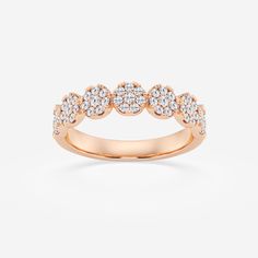 Embrace flower power with this dazzling diamond cluster ring. Scintillating diamonds are carefully arranged in floral patterns, recreating the feel of a bouquet on your finger. Ideal for stacking or wearing solo, this gorgeous ring will liven up any ensemble. Anniversary Rose Gold Cluster Ring, Rose Gold Cluster Ring For Anniversary, Rose Gold Cluster Diamond Ring With Prong Setting, Stackable 14k Gold Cluster Ring Fine Jewelry, Fine Jewelry Rose Gold Cluster Diamond Ring, Rose Gold Cubic Zirconia Cluster Ring With Gemstone, Rose Gold Cluster Ring With Brilliant Cut, Rose Gold Diamond Cluster Ring For Formal Occasions, Rose Gold Cluster Ring With Rose Cut Diamonds