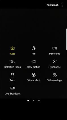 an app showing the settings and options for video editing on a smartphone screen, which is lit up at night