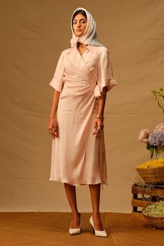 Baby pink shirt wrap dress with assymetrical collar detailing. - Aza Fashions Spring Wedding Midi-length Asymmetrical Dress, Feminine Midi Dress With Asymmetrical Hem For Formal Occasions, Feminine Midi Dress With Asymmetrical Hem For Formal Events, Elegant Spring Wrap Dress With Asymmetrical Hem, Pink Semi-formal Midi Dress, Feminine Formal Midi Dress With Asymmetrical Hem, Feminine Pink Semi-formal Dress, Fitted Asymmetrical Dress With Short Sleeves For Work, Fitted Asymmetrical Short Sleeve Dress For Work