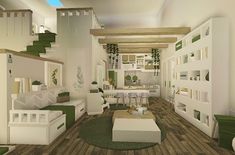 a living room filled with lots of white furniture and green decor on top of wooden floors