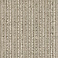 an upholstered beige and white striped fabric