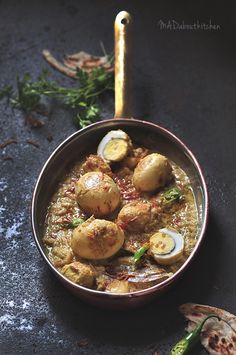 a bowl filled with food sitting on top of a table