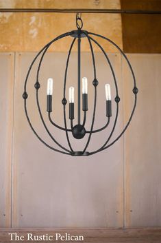 the rustic pelican chandelier is made from metal and features five lights