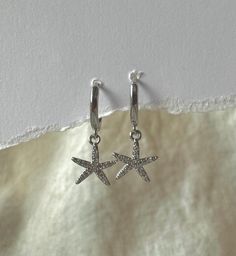 Gorgeous Boho Costal Grandma style sparkly starfish earrings beautiful for any occasion. Made to be worn alone all also to stacked.  This stunning earrings are hypoallergenic (lead and nickel free).  Perfect for everyday wear as they are Tarnish resist and waterproof,  Hoop diameter : 10mm Earrings are sold individually or as a pair  Made with 925 Sterling silver.  They are light weight. Easy to wear. Tarnish resist and sweat/waterproof, perfect for everyday wear.  All jewellery is beautifully p Grandma Style, Grandma Fashion, Starfish Earrings, Star Fish, Beach Boho, Stunning Earrings, Boho Beach, Jewelry Earrings Hoops, Jewelry Bags