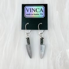 the pair of earrings is made in australia, it has a knife shaped hook on each earring