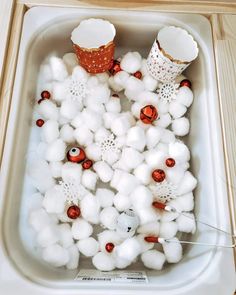 some cotton balls and other items in a sink