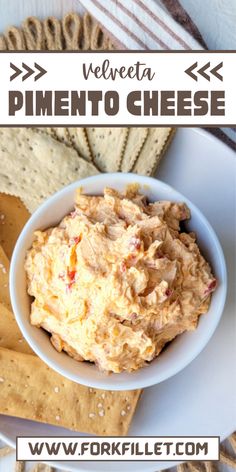 an image of a bowl of dip with crackers