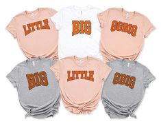 four shirts with the words big and little in orange, white, grey and pink