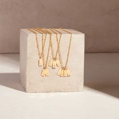 No matter where you are going, deck your neck with our classic Madeline rectangle two initial pendant. We love its modern design and versatility. Rock it alone or as the base of an on-trend layered look. 1/2" x 1/4" gold filled or sterling silver tag Hand stamped initial 16" brass satellite chain with 2" extender Lobster claw closure Made in the USA With customization this item is FINAL SALE NOTE - discs DO NOT slide on and off the chain. If you are looking to add or remove discs from the chain, Typewriter Font, Engraved Initials, Trendy Necklace, Trendy Necklaces, Disc Necklace, Custom Initials, Initial Pendant, Modern Pendant, Beautiful Necklace