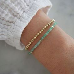 Add a special touch to your look. Our Birthstone Bead Collection styles are crafted with natural stones and three 14k gold rondelles strung on a coated wire for maximum durability. Wear your own birthstone—or a loved one’s—for a meaningful layer in any bracelet stack. Emerald is May's birthstone. Bead Collection, Bracelet Stack, Bead Bracelet, Bracelet Gift, Birthstone, Natural Stones, Gift Set, Emerald, Fine Jewelry