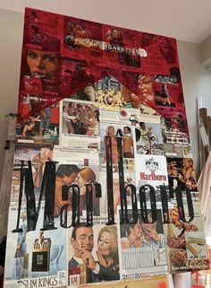 a collage of movie posters is shown on the wall