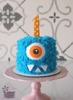 a blue cake with an eyeball on top