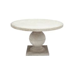 a white table with a pedestal on it's base and an oval marble top