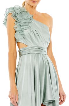 Make an unforgettable entrance in this satin gown featuring a high-low hem and a one-shoulder neck adorned by bold ruffles. At demure cutout at the side offers a peek of skin. 62 1/2" length (size 8) Hidden back-zip closure One-shoulder neck Partially lined 100% polyester Spot clean Imported Asian Owned/Founded Sage Green Dress Formal High Low, Sage Green One Shoulder Bridesmaid Dresses, Flirty One-shoulder Dress With Ruffles And Asymmetrical Neckline, Evening One-shoulder Dress With Ruffles And Asymmetrical Hem, Green Asymmetrical Neckline Pre-draped Dress, Hi Low Gown, Neutral Dresses, One Shoulder Prom Dress, Bodycon Evening Dress