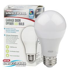 a white light bulb sitting next to an unopened box