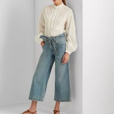 Made From Soft Denim, These Stylish Cropped Jeans Are Cut For A Fashionable Wide-Leg Silhouette And Feature An Elegant Self-Tie Sash At The Waist. High Rise. Wide-Leg Silhouette. Intended To Hit Above The Ankle. Us Size Petite 8 Has A 12" Rise And A 23.5" Leg Opening. All Sizes Have A 21.5" Inseam. Five-Pocket Styling With Signature Metal Rivets. Cotton, Lyocell. Machine Washable. Imported. Chic Denim Blue Workwear Blouse, Chic Light Wash Blouse For Work, Chic Light Colored Blouse For Work, Chic Blouse For Work, Cream Jeans, Light Denim Jeans, Blue Dress Pants, Flair Dress, Cropped Wide Leg Jeans