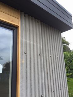 the side of a building with metal siding