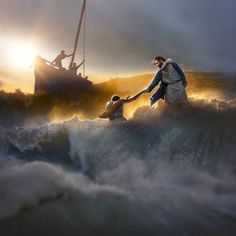 two people holding hands while standing on top of a boat in the ocean with waves