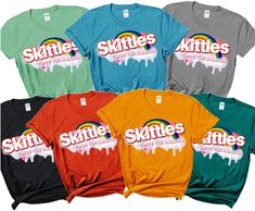 Skittles S Halloween Costume T-shirt, Candy Group Family Costume T Shirt Tee, Candy Group Halloween Costumes Teachers Bff Siblings Youth --------------------------------------------------------------------------------- It's not easy to satisfy everyone when it comes to apparel, especially when choosing one as a gift - unless you opt for our personalized apparel. A personalized shirt is a perfect gift for all occasions and makes your loved one feel even more special. ღ INFORMATION: - If you want to print the side, there will be an additional fee for printing the back side. - If you want a custom design, please message us or you can write it in the personalized box. We will design according to your needs. - We have Brand Gildan - If you enter the wrong address with your order, we will try to Group Halloween Costumes Teachers, Halloween Costumes Teachers, Taste The Rainbow, Group Halloween Costumes, Family Costumes, T Shirt Costumes, Personalized Clothes, Halloween Candy, Womens Clothing Tops