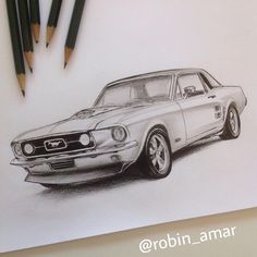 a drawing of a mustang car with pencils next to it