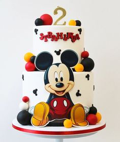 a mickey mouse birthday cake with the number two on it