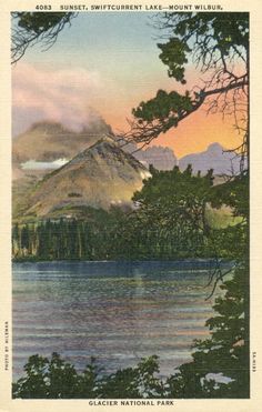 an old postcard shows the mountains and lake