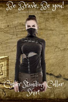 Step into a darkly elegant cyber future with the Cyber Steampunk Gothic Stand Collar T-Shirt. This futuristic dark tee features a dramatic high collar reminiscent of Victorian elegance with a rebellious twist. Made from soft, lightweight fabric, the Cyber Steampunk Gothic Stand Collar T-Shirt envelops you in gothic mystery. The stand collar and long sleeves contrast with the punk spirit of the metallic print. Silver gears, chains, and rivets adorn the black fabric for a blend of romanticism and Gothic Mystery, Victorian Style Clothing, Victorian Elegance, Collar T Shirt, Gothic Vintage, Metallic Prints, Collar Tshirt, Moda Vintage, Black Xs