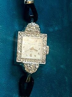 Bulova Ladies 14K and Diamond Watch 23 Jewels with Vintage Case | eBay Vintage Rectangular Watch Accessories For Evening, Elegant Rectangular Jewelry And Watches For Evening, Antique Rectangular Evening Watch, Elegant Collectible Watch With Rectangular Dial, Timeless Rectangular Jewelry And Watches For Evening, Vintage Rectangular Jewelry With Diamond Hour Markers, Elegant Formal Jewelry And Watches With Clasp, Classic Formal Jewelry And Watches With 17 Jewels, Timeless Formal Jewelry And Watches With Clasp