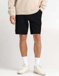 Rsq Mid-Length Chino Shorts. Falls Above The Knee. Slant Hand Pockets. Zip Fly. Button Waist. Dual Back Welt Pockets With Rsq Logo Flag At Left Side. Approximate Inseam: 9". Approximate Outseam: 19.5". 76% Cotton 21% Repreve Recycled Polyester 3% Spandex. Machine Wash. Imported. | Rsq Mid Length 9" Chino Shorts Casual Bermuda Pants For Workwear, Stretch Bermuda Shorts Casual Style, Casual Stretch Bermuda Shorts With Elastic Waistband, Casual Bottoms With Relaxed Fit And Short Inseam, Stretch Bermuda Bottoms With Elastic Waistband, Casual Bermuda Workwear Bottoms, Casual Bermuda Shorts With 5-inch Inseam And Pockets, Casual Bermuda Shorts For Work, Casual Bermuda Bottoms For Workwear