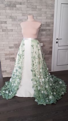 Flower embroidered light green tulle detachable wedding skirt with train - an elegant adding to your wedding gown can be matched with different styles wedding gowns and tops.  Also, the skirt can be ordered in full, with Royal satin underneath skirt, Tulle crinoline and Lining.  Please select all your preferred options and indicate your size at checkout.  Kindly note that this listing is for the skirt presented in the first pictures. In case you are interested to buy one of optional items from t Detachable Wedding Skirt, Wedding Overskirt, Bridal Skirt Separate, Train Skirt, Wedding Train, White Flower Wedding, Unreal Unearth, Bridal Skirt, Wedding Cloak