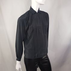 "by Kristin, black blouse with hidden buttons panel and front pleats. Fits Medium 19\" across 23\" long 23\" sleeves * Please review all shop policies before completing transaction. All sales final. No returns or exchanges. * Bundle up for combined shipping. * Instagram @vintagerunsdeepshop" Formal Fitted Blouse With Pleated Sleeves, Fall Classic Pleated Tops, Formal Collared Blouse With Pleated Sleeves, Long Sleeve Pleated Shirt For Work, Classic Pleated Blouse For Fall, Classic Pleated Tops For Fall, Pleated Long Sleeve Shirt For Work, Fitted Tops With Pleated Sleeves For Formal Occasions, Classic Long Sleeve Pleated Blouse