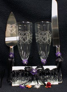 two wine glasses and a knife on a table