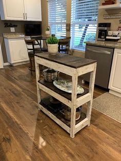 a kitchen island made out of pallet wood