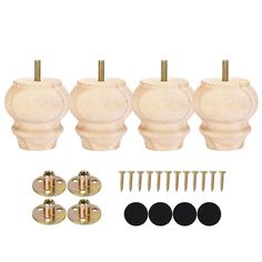 four white vases with gold hardware and screws