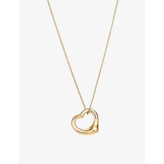 Find TIFFANY & CO. Elsa Peretti Open Heart 18ct Yellow- Necklace 16in on Editorialist. Designed by Elsa Peretti, the Open Heart necklace from Tiffany & Co celebrates love. Crafted from 18-carat yellow gold, it’s punctuated with a dangling heart charm on the cable chain and fastens through a lobster-clasp closure. If you ask us, we think that it makes the perfect gift for loved ones – or, you know, yourself works too (there’s no judgement here). Team yours with the matching bracelet.| Tiffany & Co 18ct yellow-gold necklace18ct yellow goldSpring-ring clasp fasteningCable chain, heart charmChain length: 16'Please use a soft, dry polishing cloth Tiffany Elsa Peretti Necklace, Elsa Peretti Necklace, Tiffany Gold, Ysl Lip, Versace Ring, Cult Gaia Bag, No Judgement, Tods Bag, Open Heart Necklace