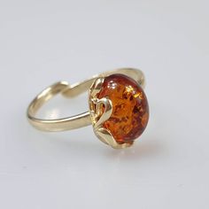 Gemstone Ring, Small Crystal Ring, Adjustable Gold Ring, Baltic Amber, minimalistic rings, amber ring, handmade jewelry. Very small and cute ring - 1 cm. Adjustable size. All parts gold plated sterling silver 925. Minimalist Amber Ring Jewelry, Orange Open Ring Jewelry For Gift, Orange Open Ring Jewelry As Gift, Adjustable Orange Jewelry Ring, Handmade Minimalist Adjustable Birthstone Ring, Handmade Adjustable Minimalist Birthstone Ring, Adjustable Amber Ring Jewelry, Classic Amber Rings For Gifts, Adjustable Amber Open Ring Jewelry