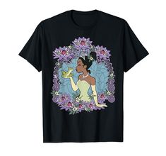 PRICES MAY VARY. Officially Licensed Disney Princess And The Frog Apparel 17PRIN00405A-002 Lightweight, Classic fit, Double-needle sleeve and bottom hem Disney Princess And The Frog, Tiana And Naveen, Princess And The Frog, Floral Frame, Portrait Frame, Disney Tshirts, The Frog, Branded T Shirts, Top Styles