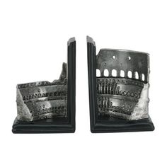 two black bookends with roman ruins on them