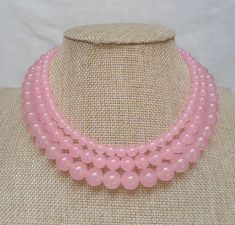 PREFERENTIAL POLICIES : The order is $50 or more.There will be a 10% discount.long-term effective. Please use the coupon code: CZH10 Welcome back to my shop: https://www.etsy.com/shop/pearlandjewelry Description of the product in the picture: The necklace lengh is 16---18 inches ,I make the necklace to use 6mm,8mm,10mm pure natural light pink jade bead, IT is good necklace for your great wedding, Pearl Jewelry: necklace Pearl Type: jade bead color: light pink size: 6mm 8mm 10 mm length: 16---18 Elegant Pink Crystal Necklaces For Weddings, Pink Round Beads Jewelry For Bridesmaid Gift, Pink Crystal Necklaces For Wedding, Pink Round Bead Necklaces For Wedding, Pink Bridal Necklace With Round Beads As Gift, Pink Bridal Necklace Gift, Pink Round Bridal Necklace Gift, Good Necklace, Wedding Pearl Jewelry