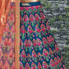 Look stunning in this Blue and red Embroidered Designer sabyasachi bridal wedding Lehenga Choli.
The lehenga is made of Mulbury Silk fabric that has been enhanced with lovely heavy floral embroidery all over with stone embellishments.
It Comes along with unstitched red Mulbury Silk blouse piece with Thread, Dori, Zari, Sequins Embroiderey with stone work. It has embroidered lace soft netted Orange colored dupatta to complete the look Wedding Ghagra, Bridesmaid Dresses Indian, Embroidery Lehenga, Green Lehenga Choli, Sabyasachi Bridal, Lehenga Bridesmaid, Wedding Lehenga Choli, Sabyasachi Lehenga, Bollywood Lehenga