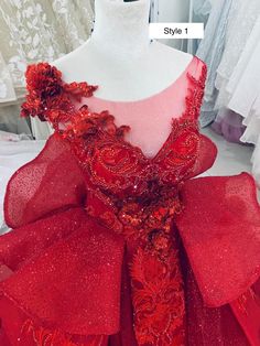 a red dress on display in a store