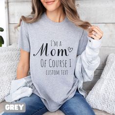 Celebrate the extraordinary mom in your life with our custom-designed "I'm a Mom, Of Course I..." shirt! This Mother's Day, give her a gift that perfectly captures the essence of motherhood and showcases her unique personality. Personalize this shirt with your choice of phrases that reflect the amazing things she does as a mom. Whether it's "I'm a Mom, Of Course I Rock the Mom Bun" or "I'm a Mom, Of Course I Can Do a Million Things at Once," we'll create a shirt that's as special as she is.This Mom Bun, Funny Mom Gifts, Personalized Mother's Day Gifts, Personalized Gifts For Mom, Create Shirts, Mothers Day Shirts, Trendy Shirts, Girl Mom, Birthday Gifts For Her