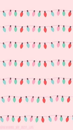 a pink background with small christmas lights on the string and hearts hanging from it's sides